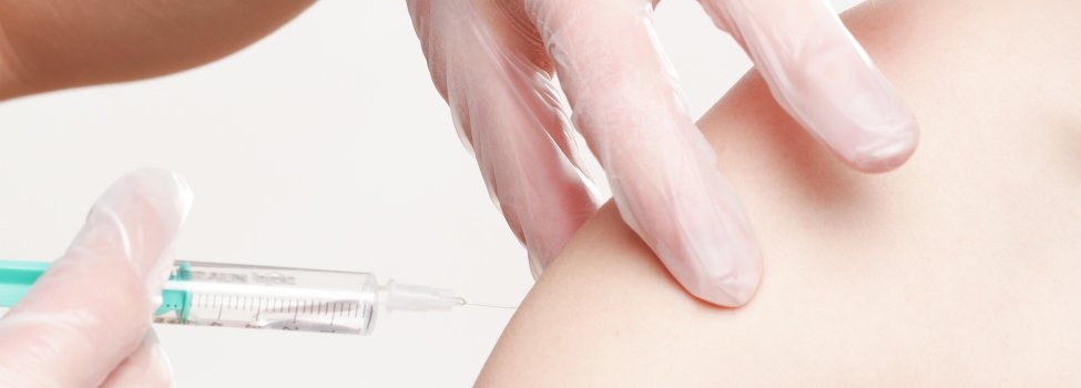 Impfung mit einer Spritze