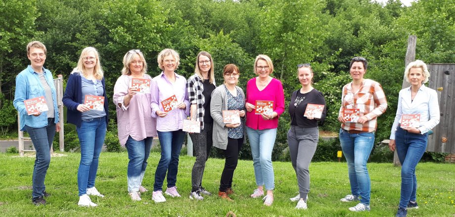 Frauen auf einem Gruppenfoto