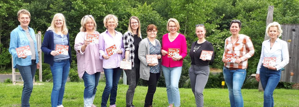 Frauen auf einem Gruppenfoto