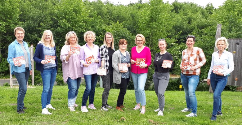 Frauen auf einem Gruppenfoto